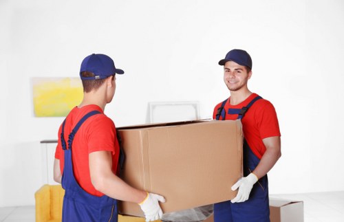 Man with a van loading furniture in Harmondsworth