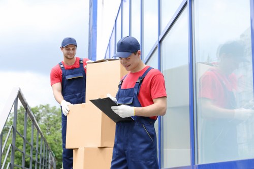 Loading furniture and boxes into a removal truck