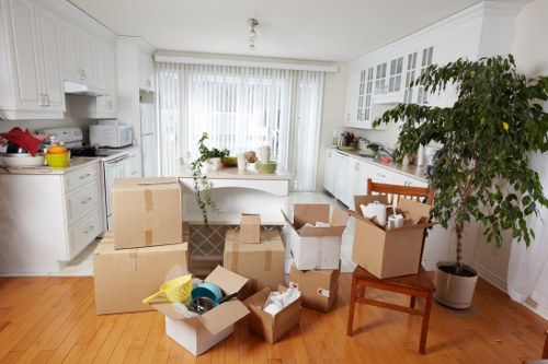 Loading furniture and boxes into a removal van in Harmondsworth