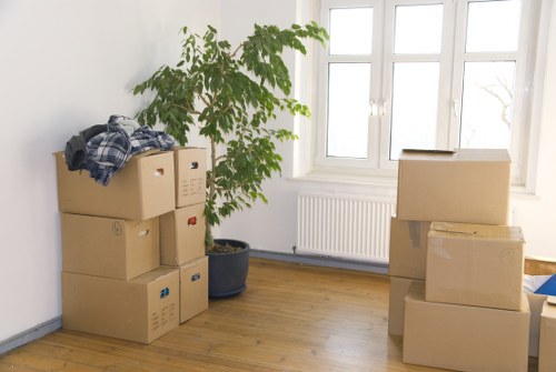 Local team collecting a sofa and chairs from a Harmondsworth property