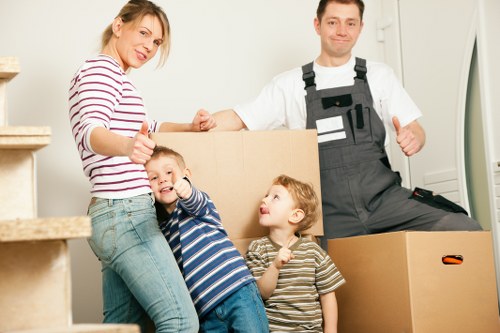 Commercial office relocation team handling equipment and files